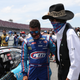 Bubba Wallace shared an emotional moment with team owner Richard Petty on Monday at Talladega Superspeedway.